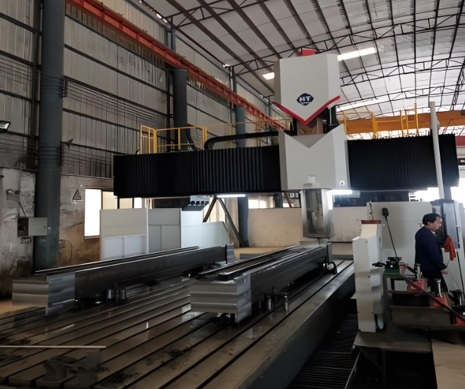 Fabricated metal product: Gantry milling machine processing base component of mechanical device
