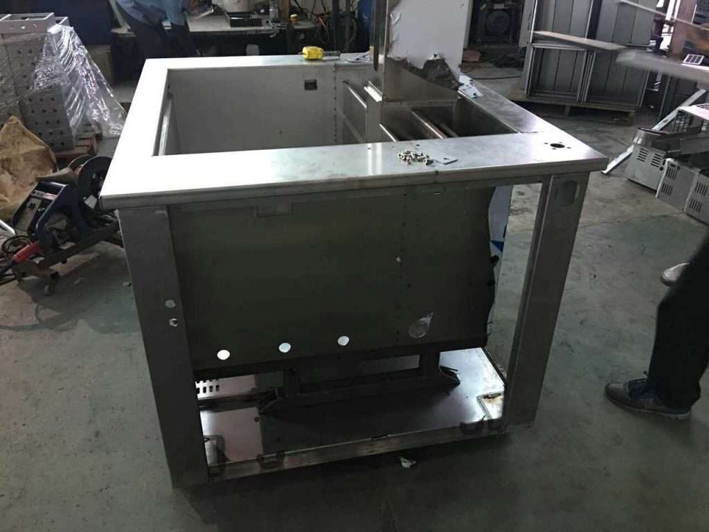 Industrial sheet metal fabrication: Stainless steel outer shell of ultrasonic cleaning machine before painting, showcasing precision CNC-machined 45# round steel lifting axis with chrome plating